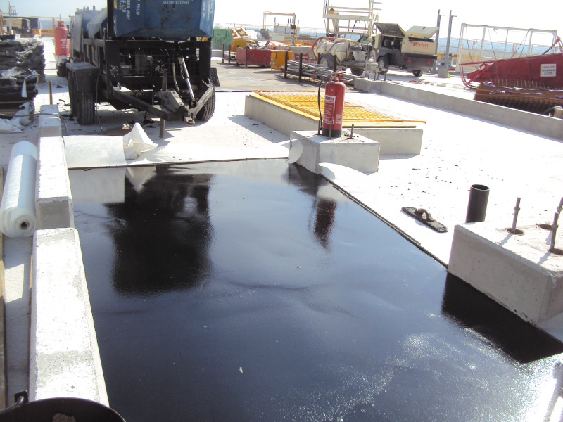 Roof screed installation using IKO Permascreed LI to reduce programme delays and support follow-on trades