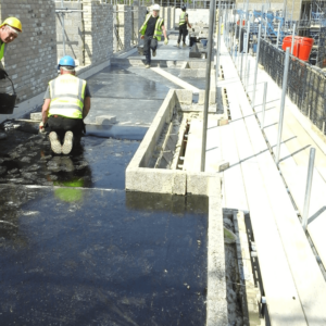 Photo of IKO Permascreed H (Heavy Duty) mastic asphalt screeding being installed