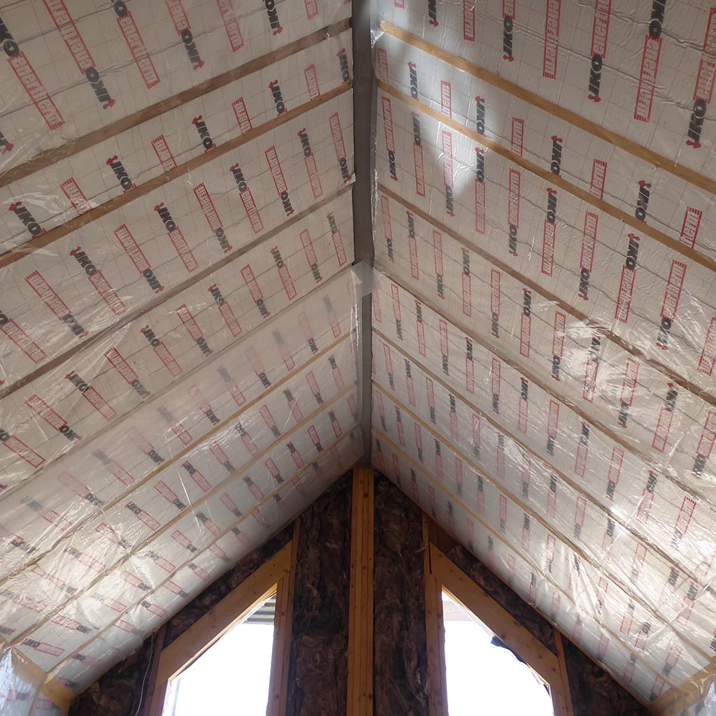 Photo of installed pitched roof insulation at Highwood House, West Coast of Scotland