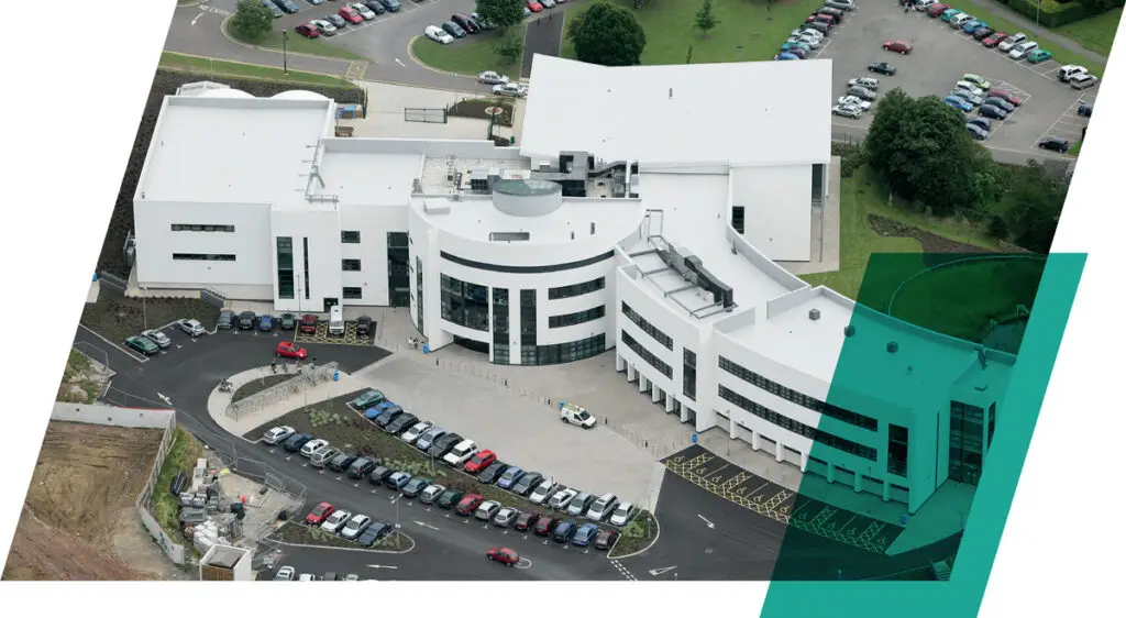 Bird's eye view of a white IKO Spectraplan TPE waterproofing membrane system used on the Stroud College roof