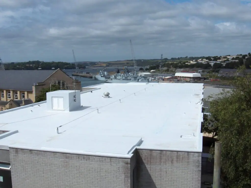 Photo of a completed IKO Spectraplan adhered roofing system on a flat roof