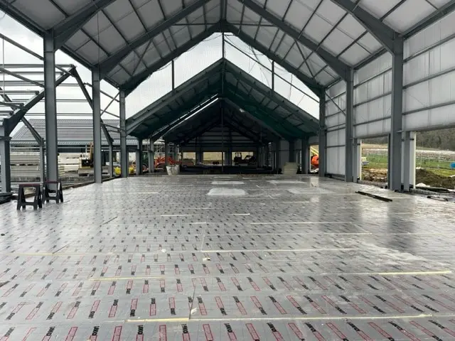 Photo of the IKO enertherm ALU Floor Insulation System being installed at Brocksbushes Farm Shop