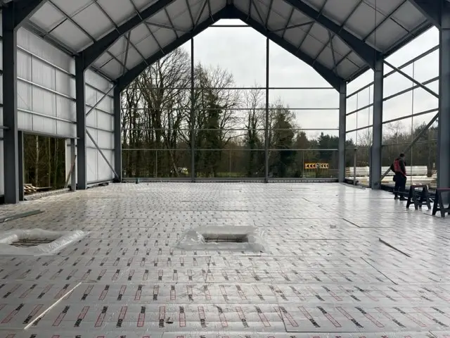 Photo of the IKO enertherm ALU Floor Insulation System being installed at Brocksbushes Farm Shop