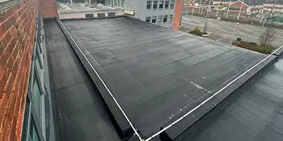 Photo of one of our IKO reinforced bituminous membrane roofing systems