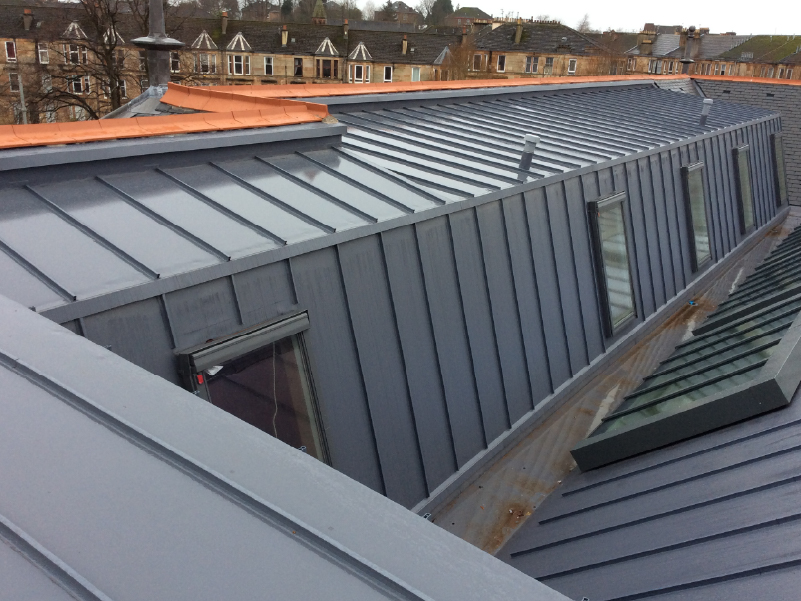 Photo of the IKO Armourplan P single ply membrane roofing system with standing seam effect waterproofing at Holmlea Primary School in Glasgow