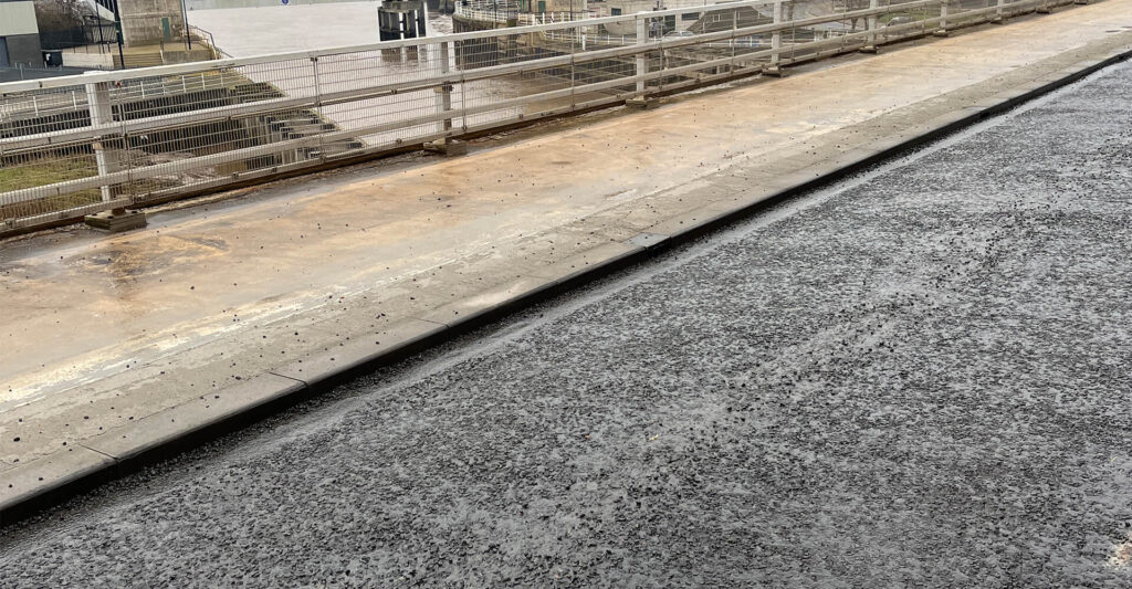 Photo of an IKO Permatrack Bridge Surfacing System being installed on Myton Swing Bridge in Hull