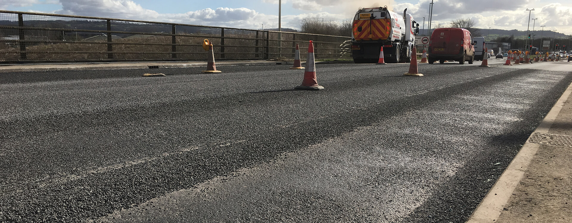 Photo of an IKO Permatrack Bridge Surfacing System being installed on Netheridge Swing Bridge in Gloucester