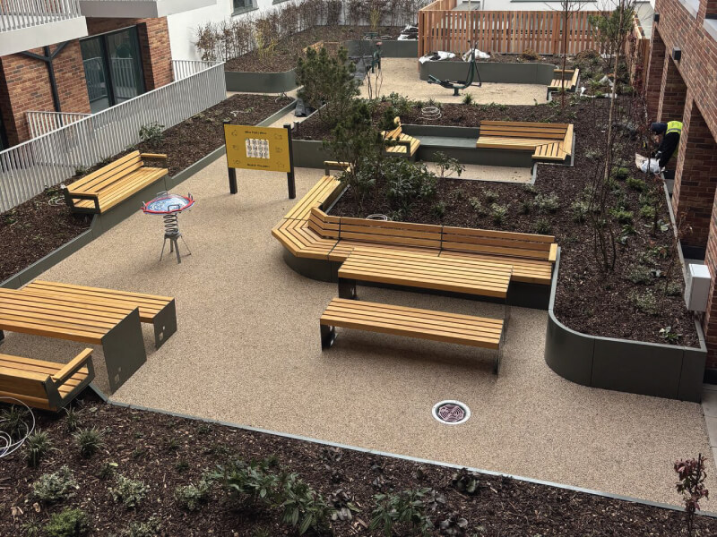 Photo of the IKO Permatec LI Anti-Root Inverted Roofing and Waterproofing System with IKO Elements Extensive Green Roof System at the Chiswick Health Centre and Residential Building project